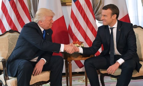 US president Donald Trump and French president Emmanuel Macron shake hands on 25 May 2017.