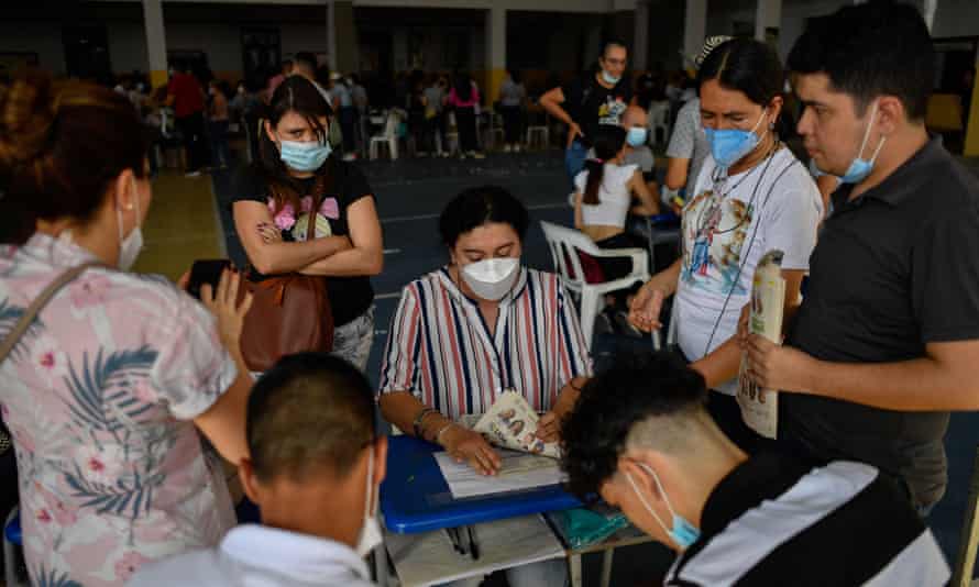 Members of the Electoral Jury count ballots at a polling station after voting closed in Cucuta, Colombia