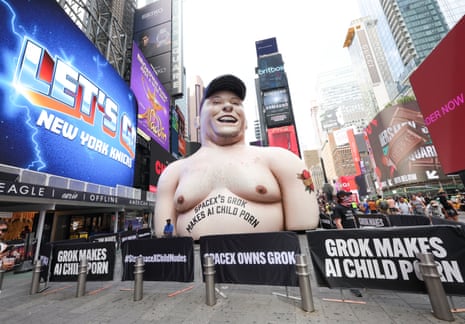 An inflatable statue with the likeness of Elon Musk in Times Square ahead of SpaceX's initial public offering (IPO) on June 11, 2026 in New York City.