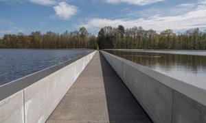 Cycling through water in Limburg.