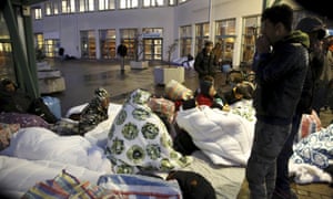 Refugees sleep outside the Swedish Migration Agency’s arrival centre in Malmo. Sweden is reported to be conisidering deporting as many as 80,000 asylum seekers.