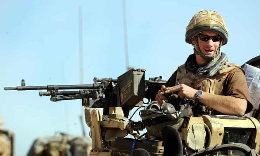 Prince Harry sitting in his position on a Spartan armoured vehicle in Helmand province, Southern Afghanistan.