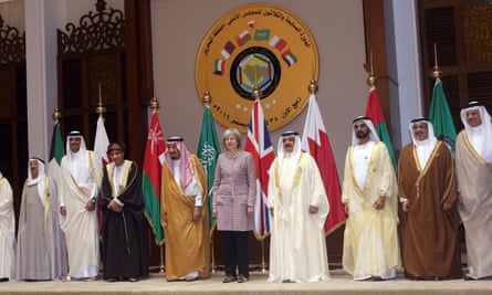 Theresa May poses with Gulf Cooperation Council leaders for a group picture.