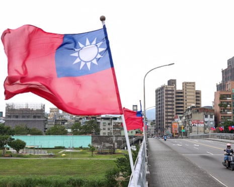 Flags of Taiwan are seen on a bridge in Taipei