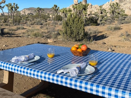 blue gingham tablecloth on table outside in desert