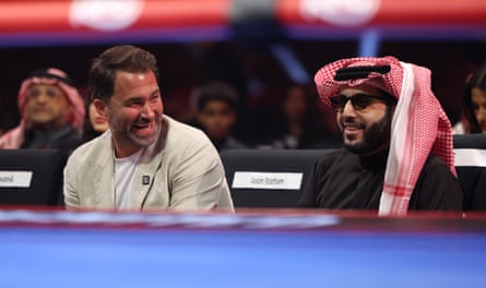 Eddie Hearn, left, watches the December rematch between Oleksandr Usyk and Tyson Fury alongside Saudi Arabia’s boxing czar Turki al-Sheikh.