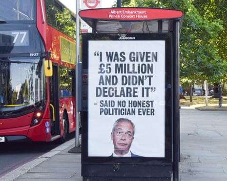 A poster installed by activists on a bus stop on Albert Embankment near Reform UK headquarters