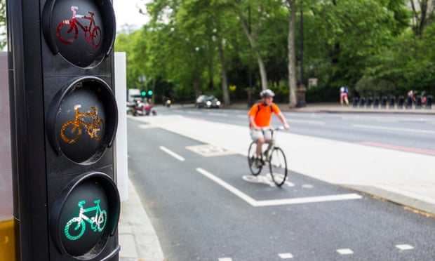 A person on a bike in London
