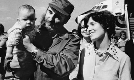 Margaret Trudeau smiles as Cuban President Fidel Castro holds her youngest son Michel after the Trudeaus arrived in Havana, Cuba in 1976.