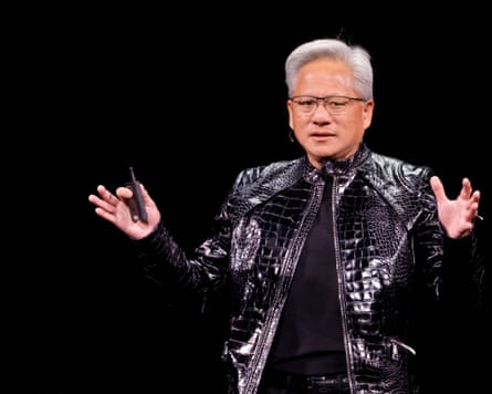 person wearing glasses and black jacket gestures while speaking
