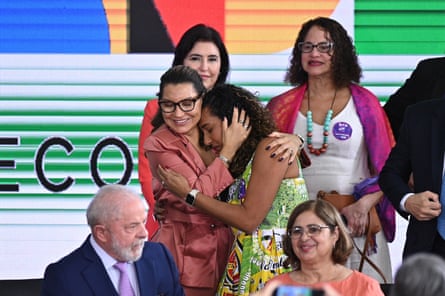 Anielle Franco is embraced by Rosângela Lula da Silva, with her husband, Brazil’s president Luiz Inácio Lula da Silva, in the foreground.