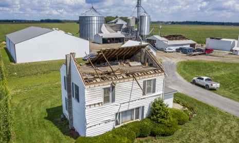 ‘Grain bins were crumpled like aluminum foil. Three hundred thousand people remained without power in Iowa and Illinois on Friday.’