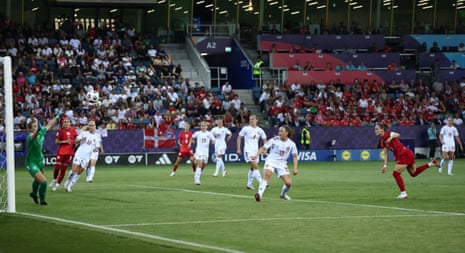 Poland’s Ewa Pajor heads their second goal past Denmark’s keeper Maja Bay Ostergaard.