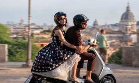 Lily Collins as Emily and Eugenio Franceschini as Marcello in Emily in Paris.