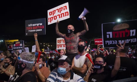 Israelis gather in Tel Aviv to protest against the government’s economic response to the corornavirus pandemic.