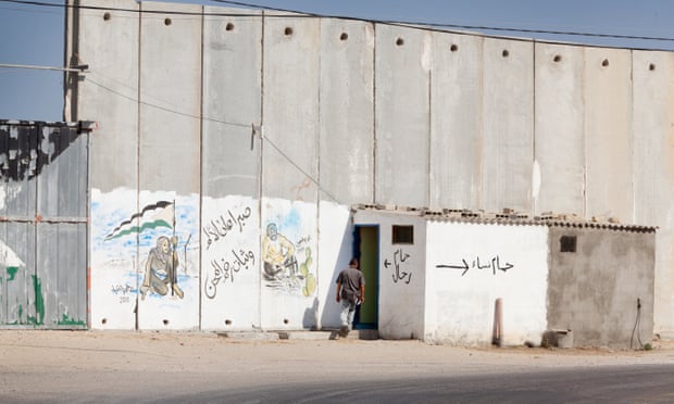 A toilet by the wall barrier near the Rafah crossing point into Egypt from Gaza.