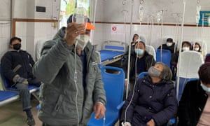 Patients receive intravenous drip treatment at a hospital in China amid the coronavirus pandemic