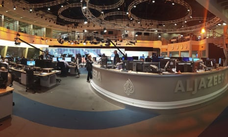 Al-Jazeera staff work in Doha, Qatar