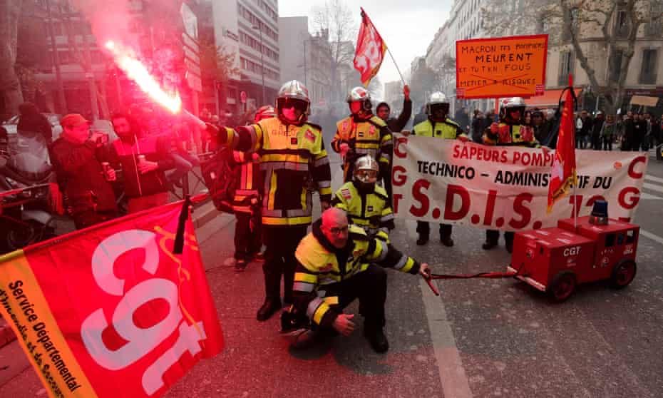 French firefighters take part in a demonstration against pension reforms in Marseille on Thursday.