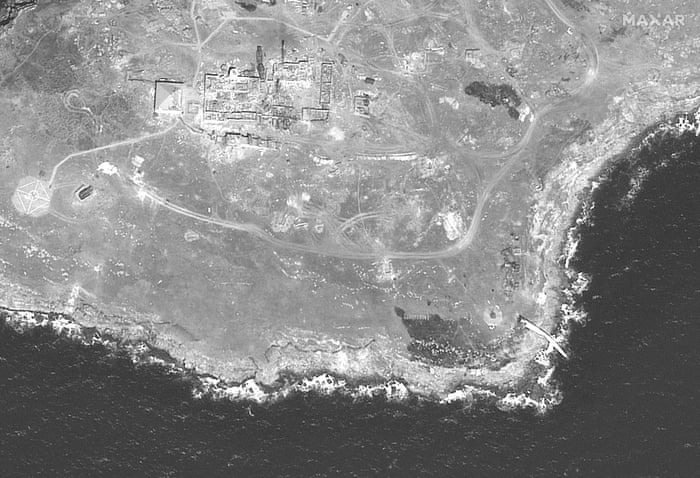 A destroyed tower seen on the southern end of Snake Island in a satellite image provided by Maxar Technologies on 21 June.