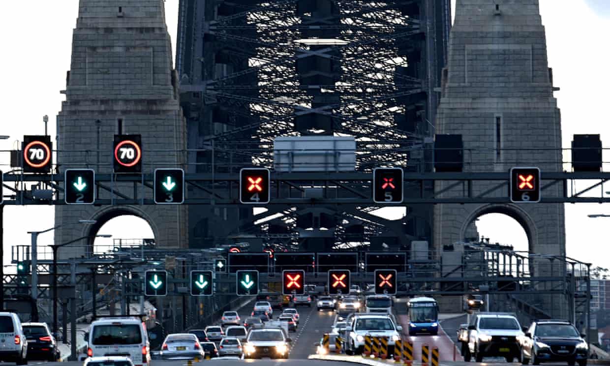 Drivers on the Sydney Harbour Bridge and tunnel would be forced to pay fees in both directions under the NSW government’s interim report of its review into Sydney’s toll road network. Photograph: Saeed Khan/AFP/Getty Images