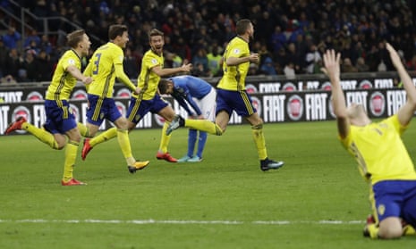 The Sweden players react to their world Cup qualification at the final whistle after their defiant draw in Italy. 