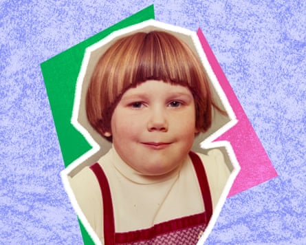 Young girl with red hair cut in a page boy style