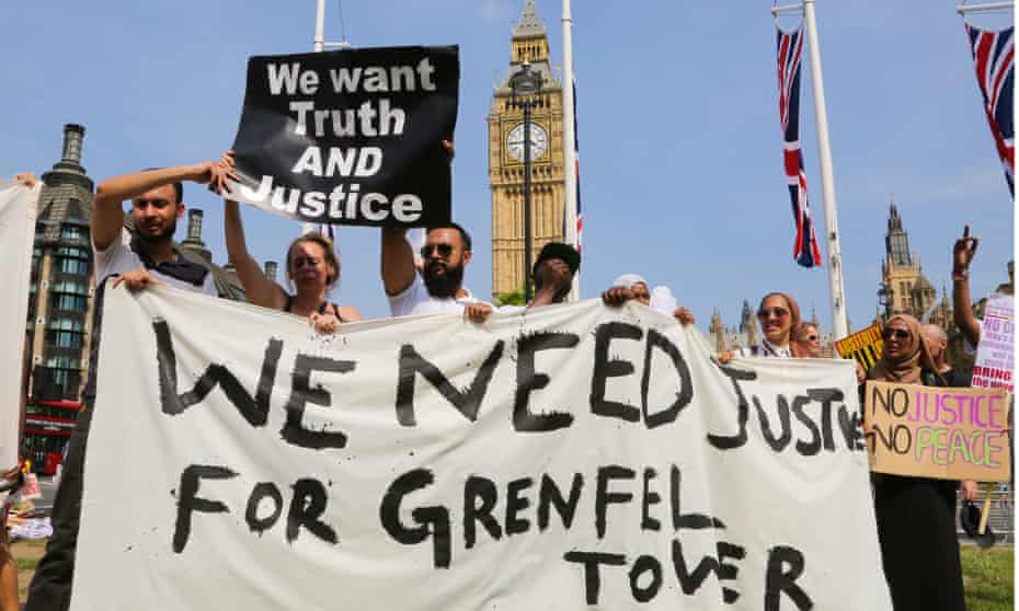 Protesters take part in Justice for Grenfell Tower in Parliament Square.