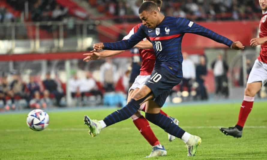 France’s forward Kylian Mbappe scores.