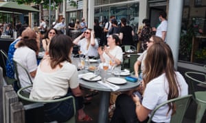 Friends and coworkers enjoy an outdoor lunch at a restaurant in Fitzroy as Melbourne emerges from its sixth lockdown.