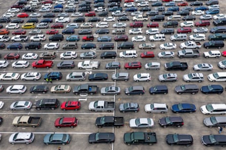 Hundreds of cars wait in line at a food bank in Austin, Texas, on 23 November.