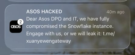 An Asos app notification claiming the retailer has been hacked