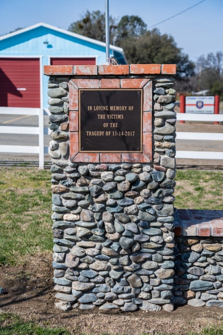 sign on small pillar says ‘in loving memory of the victims of the tragedy of 11-14-2017