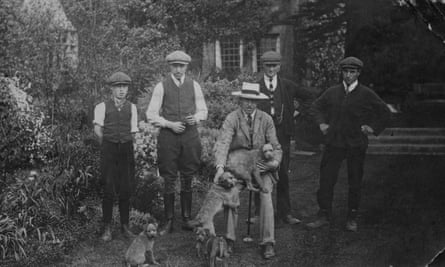 'If it wasn't for him, this wouldn't exist': Lawrence Johnston with gardeners and his dogs at Hidcote in the 1930s.