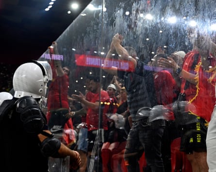 Police units stand in front of Albania’s supporters during the qualifier