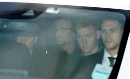 Jürgen Klopp is driven away after arriving at John Lennon Airport in Liverpool.