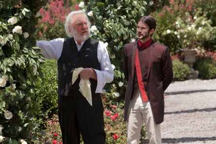 Donald Sutherland as President Snow pruning roses in The Hunger Games