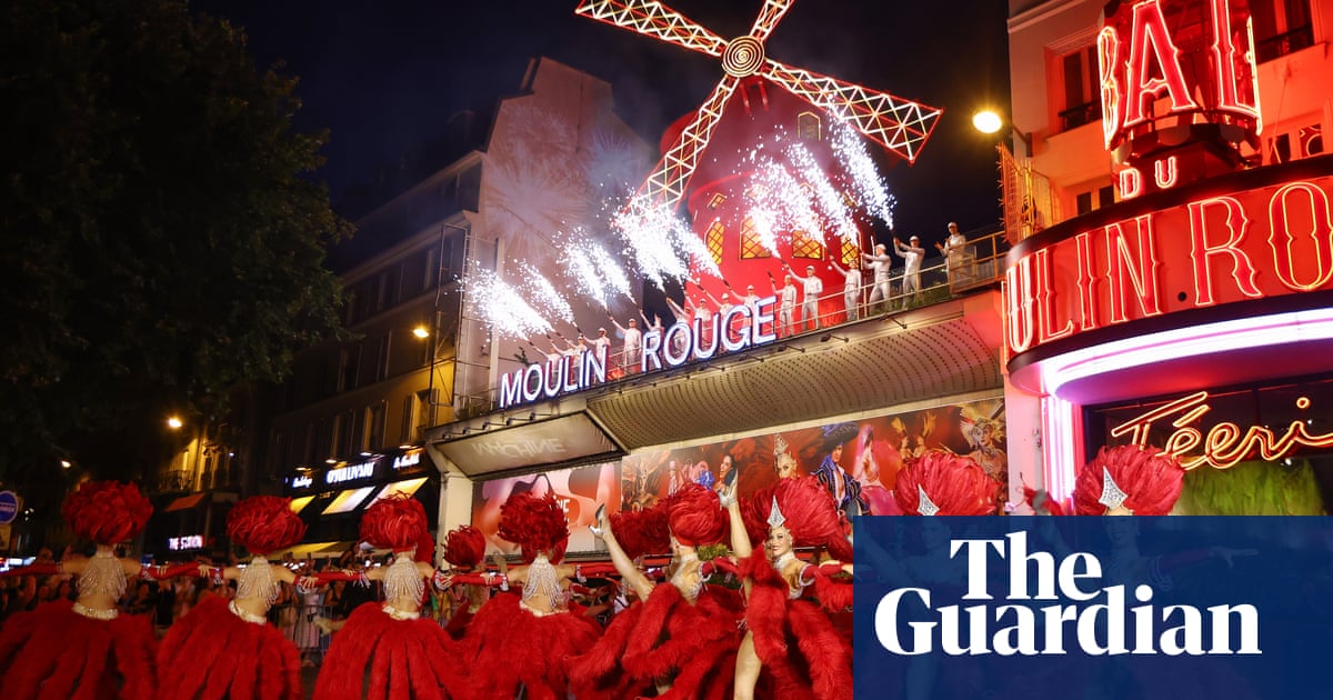 Paris rejoices as Moulin Rouge windmill sails turn again year after collapse