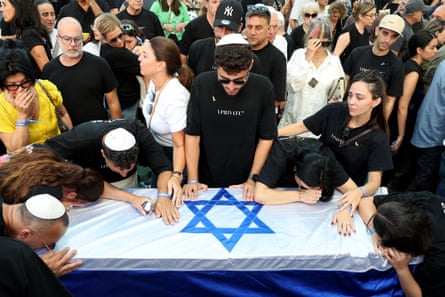 Mourners attend the funeral of Israeli hostage Jonathan Samerano at the Nahalat Yitzhak cemetery in Tel Aviv. Jonathan Samerano is one of three Israeli hostages whose bodies were found in Gaza.