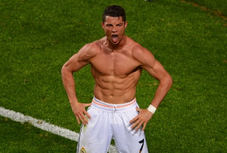 LISBON, PORTUGAL - 24 MEI: Cristiano Ronaldo dari Real Madrid merayakan gol keempat mereka dari titik penalti selama Final Liga Champions UEFA antara Real Madrid dan Atletico de Madrid di Estadio da Luz pada 24 Mei 2014 di Lisbon, Portugal. (Foto oleh Lars Baron/Getty Images)