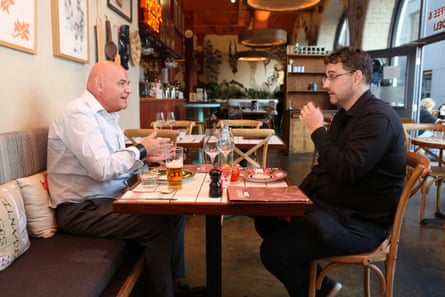 Richard and Joe chatting across a restaurant table