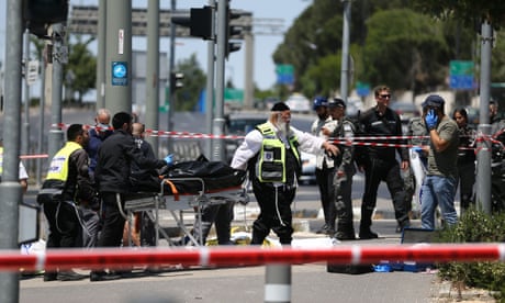 Israeli security forces block road and inspect the site after a Palestinian man was shot and killed by Israeli forces for allegedly attempting to carry out a stabbing.