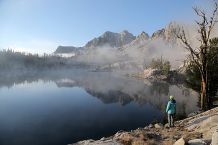 Sara Lundy at dawn by the Upper Redfish lakes