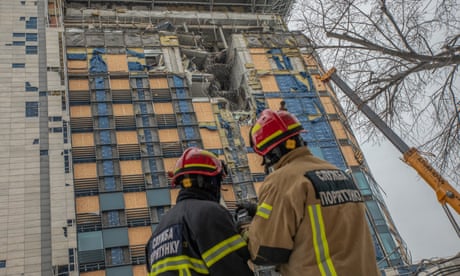 Firefighters, rescue workers and state emergency Service at the Kharkiv Palece hit on the 30th of December