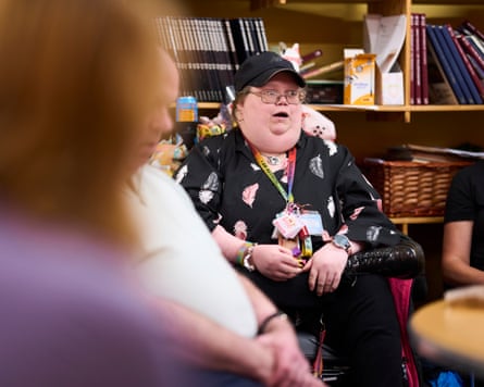 Sian Cowley sitting with others at the support group meeting