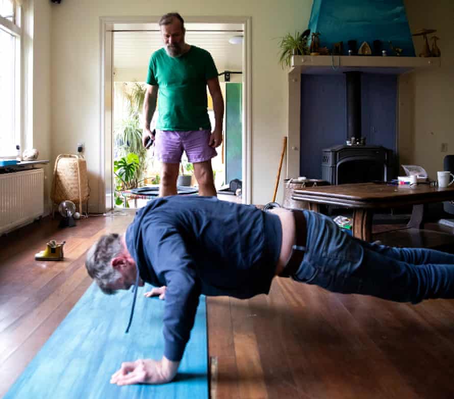 Sam Wollaston, holding his breath, manages 20 press-ups.