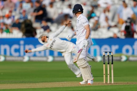 Salman Ali Agha takes the catch to dismiss Jordan Cox.