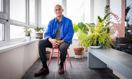 Colin Grant surrounded by plants in his Brighton home.