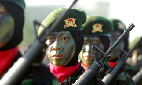 Women from the Indonesian army on parade. The chief of staff has indicated that the controversial ‘virginity test’ for recruits will end.