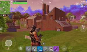 Fortnite’s smartphone version uses virtual controls, with the aim, jump and crouch buttons all bunched up together.
